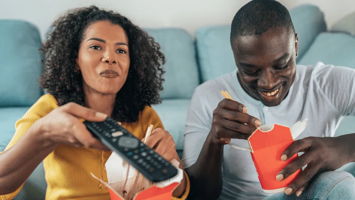 Does watching television with meals cause you to overeat?
